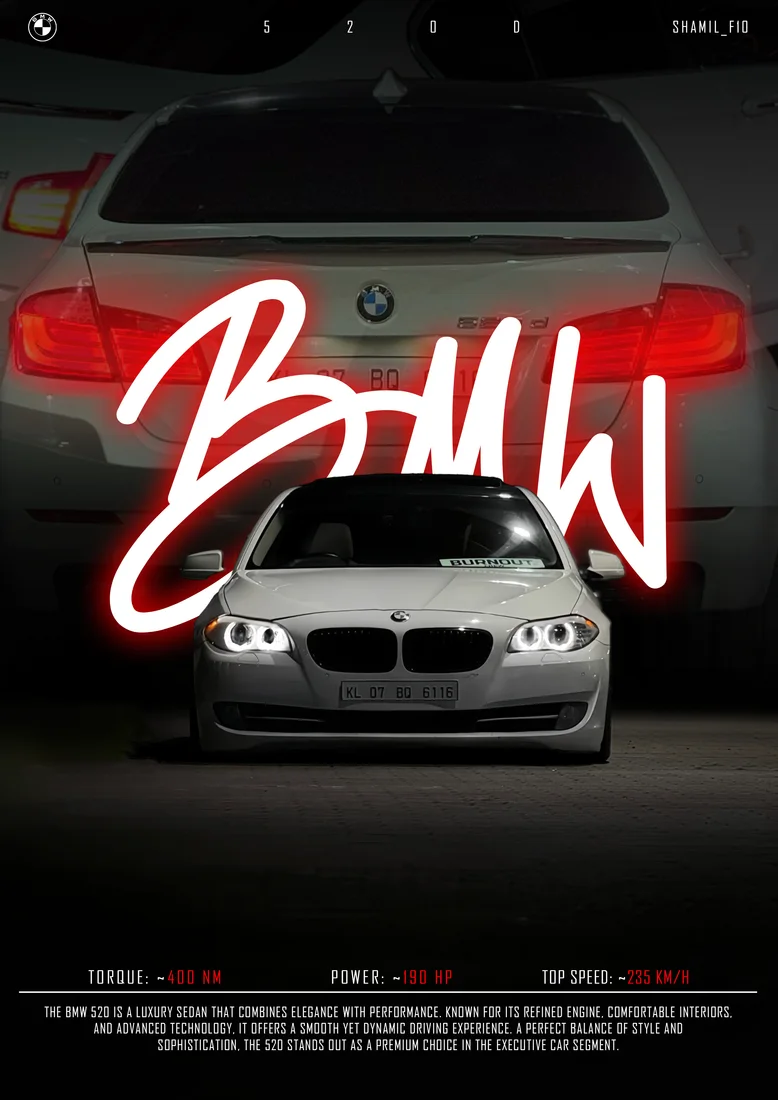 Silver BMW front view with illuminated headlights, rear-view backdrop and white script.